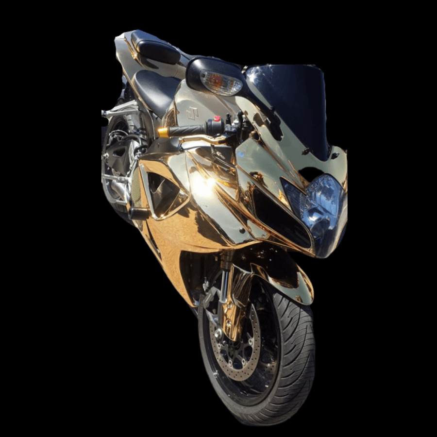 paauksuotas motociklas